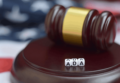 Gavel with ADA letters and U.S. flag.